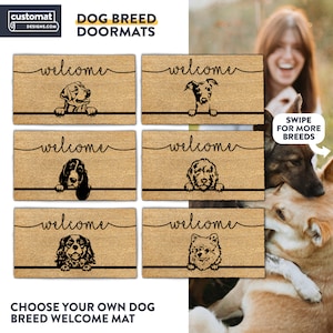May include: Six different welcome doormats with various dog breeds peeking over the top. The doormats are brown and have the word "welcome" written in black cursive. The dog breeds include a Labrador Retriever, a Greyhound, a Basset Hound, a Goldendoodle, a Cavalier King Charles Spaniel, and a Pomeranian.