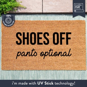 a door mat that says shoes off pants optional