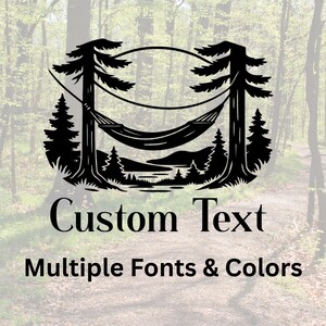 May include: Black silhouette design featuring a hammock strung between two trees, with a mountain and lake scene below. The words "Custom Text" and "Multiple Fonts & Colors" are displayed below the image.