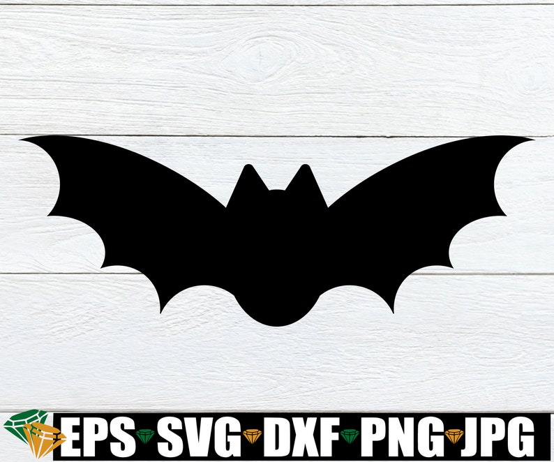 May include: A black silhouette of a bat with wings spread out against a white woodgrain background.