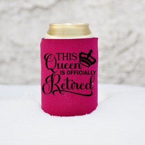 May include: A pink can cooler with the text "This Queen is Officially Retired" and a crown graphic.