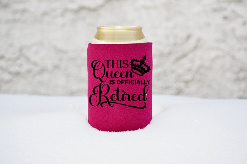 May include: A pink can cooler with the text "This Queen is Officially Retired" and a crown graphic.