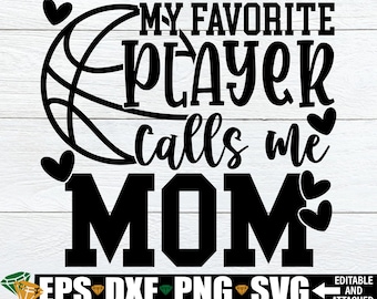 May include: Black and white graphic design featuring a basketball, hearts, and the text "My Favourite Player Calls Me Mom".