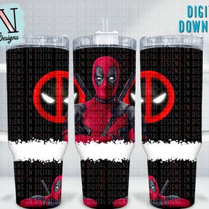 May include: A tumbler featuring a Deadpool design. The design includes the Deadpool character, a red and black color scheme, and the text "ZN Digital Designs" and "Digital Download". The tumbler has a white handle.