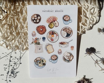 May include: A sheet of stickers featuring watercolor illustrations of various brunch foods, including coffee, toast, eggs, fruit, and pastries. The stickers are labeled "Saturday Brunch" and "Oat & Flour".