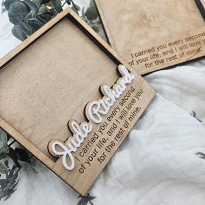 May include: Two square wooden boxes with lids. The top lid features the white 3D script name Jude Richard and the engraved text: I carried you every second of your life, and I will love you for the rest of mine. The base also has the same text.