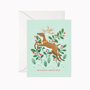 Carte de renne de voeux de saison