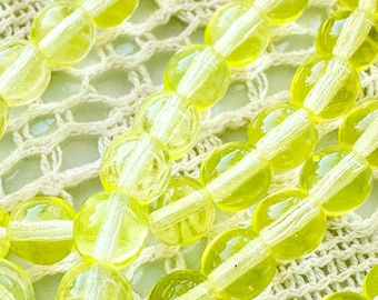 Perlas de vidrio de vaselina de uranio / 6 mm / 25 cuentas por tira
