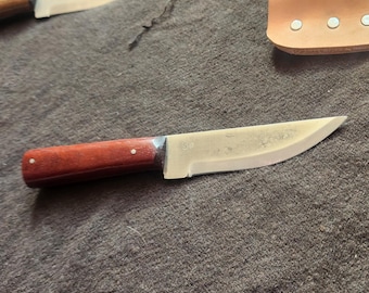 Bluff #6 knife, African red paduak wood handle. Frontier style sheath