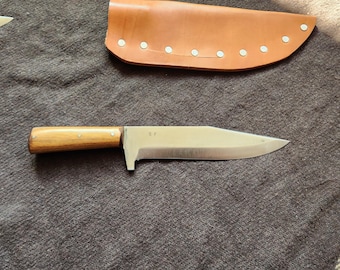 Raptor #3 , walnut wood handle. Frontier style sheath