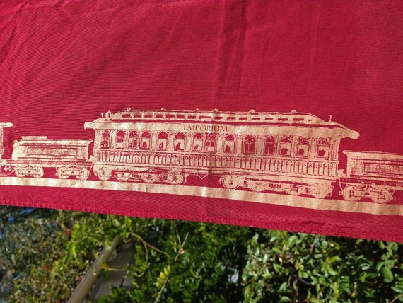 Vintage red and gold Emporium train car scarf. Po… - image 2