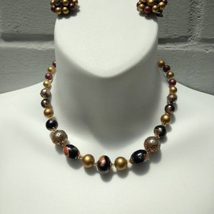 Vintage mid century necklace and clip on earrings made in Japan