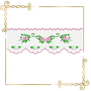 May include: A white lace trim featuring a scalloped edge outlined in pink thread. The lace is decorated with embroidered floral motifs consisting of pink and white roses, green leaves, and green swirling vine accents across the fabric.