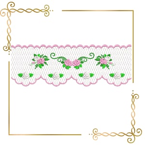 May include: A white lace trim with pink and green floral embroidery. The trim features a scalloped edge and delicate floral designs.