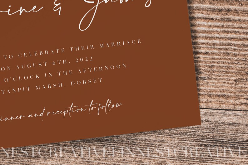 May include: A brown invitation card with white text announcing a wedding. The text reads "To celebrate their marriage on August 6th, 2022 o'clock in the afternoon Tanpit Marsh, Dorset. Dinner and reception to follow."