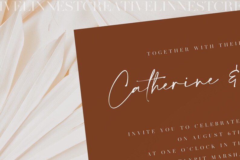 May include: A brown invitation card with white text that reads "Together with their families, Catherine & [unclear text] invite you to celebrate on August 6th at one o'clock in the [unclear text] at [unclear text] Marsh."