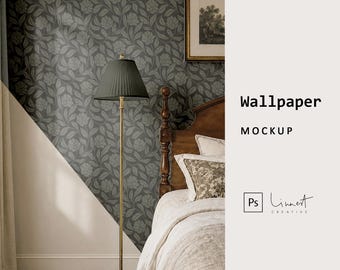 May include: A floor lamp with a dark green pleated shade and a brass-coloured base stands next to a bed with a floral patterned wallpaper. The wallpaper is dark grey with a repeating floral design. The text "Wallpaper MOCKUP" is visible.