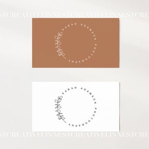 May include: Two business cards with a brown and white background. The text on the cards reads "Sarah Adamson Photography" in a circle with a branch design.