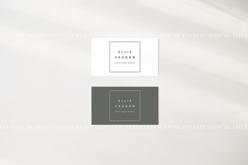 May include: Two business cards with the text "Ellie Vaughn Photography" in a white square on a white background and a gray square on a gray background.