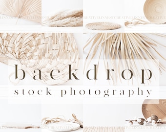 May include: A collection of natural elements, including dried palm leaves, pampas grass, and woven baskets, arranged on a white backdrop. The text "backdrop stock photography" is displayed in the center of the image.