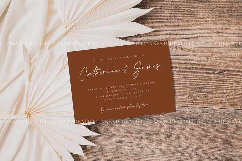 May include: A brown wedding invitation card with white text. The card reads "Together with their families, Catherine & James, Invite you to celebrate their marriage on August 6th, 2022 at one o'clock in the afternoon, Stanpit Marsh, Hornet. Dinner and reception to follow."