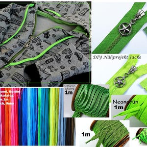 May include: A grey hoodie with a black vehicle print, neon green drawstrings, and a star-shaped zipper pull. Includes green zippers, spools of neon green and black striped cord, and a multi-colored display of flat 8mm wide hoodie drawstrings.
