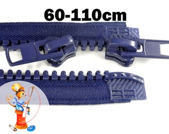 May include: A dark blue plastic zipper with two matching sliders and a length range of 60-110cm printed above. The zipper features thick, molded teeth and a fabric tape edge, with a small illustration of a mouse sewing on a spool in the corner.