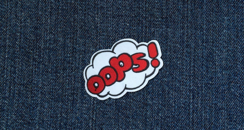 Op de afbeelding: Een witte spraakballon met een rode omtrek en het woord "Oops!" in rode letters.