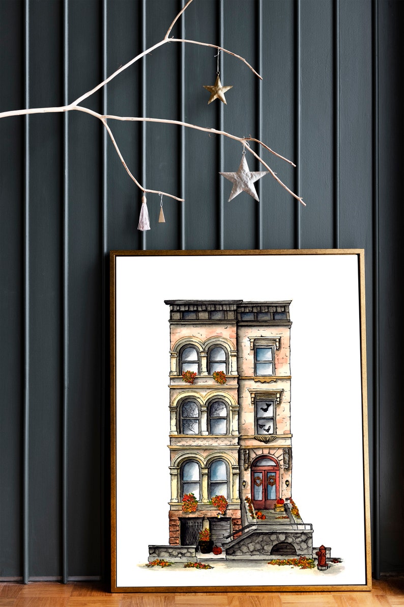 May include: A watercolor painting of a three-story brownstone building with a red door and a stone stoop. The building has a yellow trim and windows with black frames. There are fall leaves scattered on the ground in front of the building.