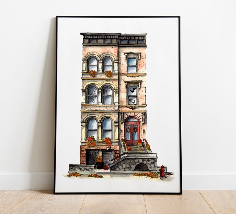 May include: A watercolor painting of a three-story brownstone building with a red door and a stone stoop. The building has a brick facade with white trim and windows. There are fall leaves and pumpkins on the stoop.