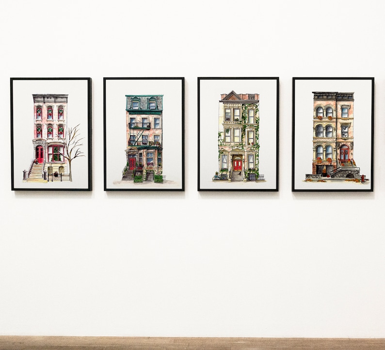 May include: Four framed watercolor paintings of brownstone buildings with red doors and green ivy. The buildings are depicted in a realistic style with details like windows, fire escapes, and stoops.