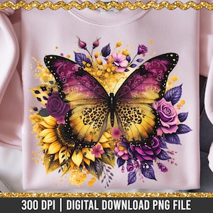 May include: A pale pink sweatshirt with a vibrant butterfly design. The butterfly has yellow and purple wings, set against sunflowers, roses, and other flowers. The text "Digital SVG Designs For You" is visible.