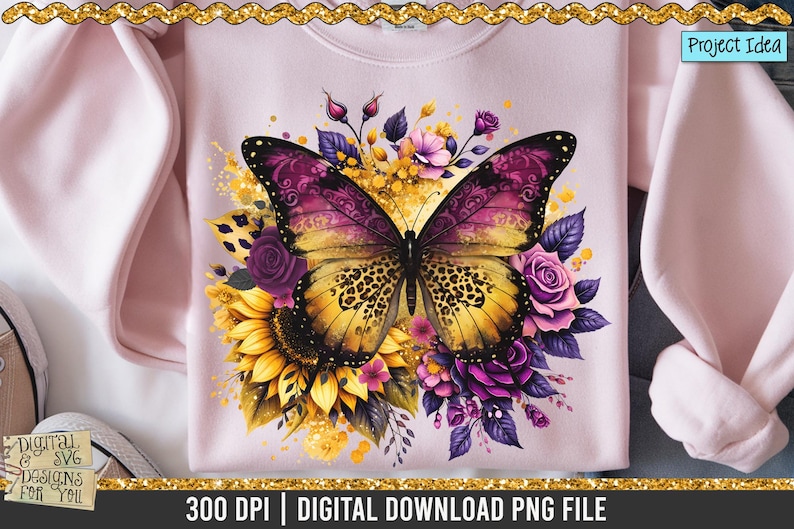 May include: A pale pink sweatshirt with a vibrant butterfly design. The butterfly has yellow and purple wings, set against sunflowers, roses, and other flowers. The text "Digital SVG Designs For You" is visible.