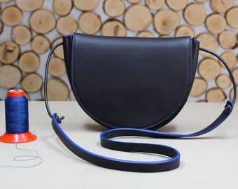 handmade half round black leather shoulder bag with blue details, half moon leather crossbody bag