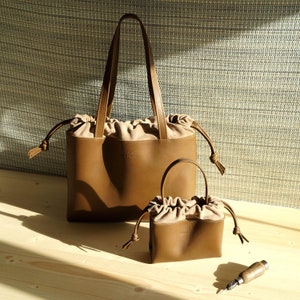 Large handmade leather bag in a pouch shape image 10