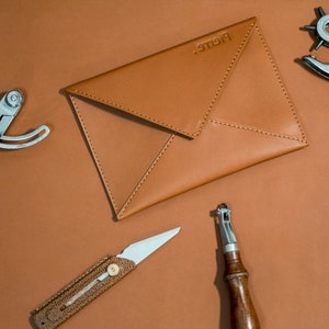 handmade leather laptop sleeve, envelope style notebook case, personalised laptop bag Cognac