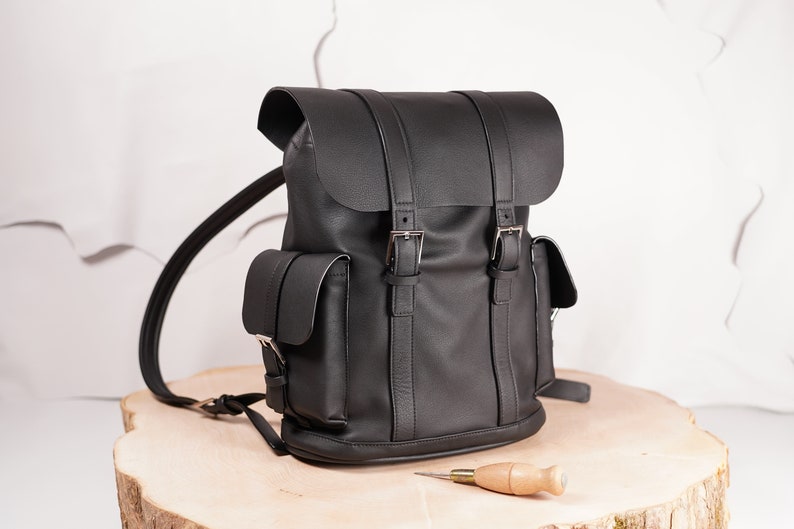 Small leather backpack in alpin style image 1