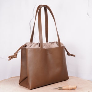 Large handmade leather bag in a pouch shape image 2