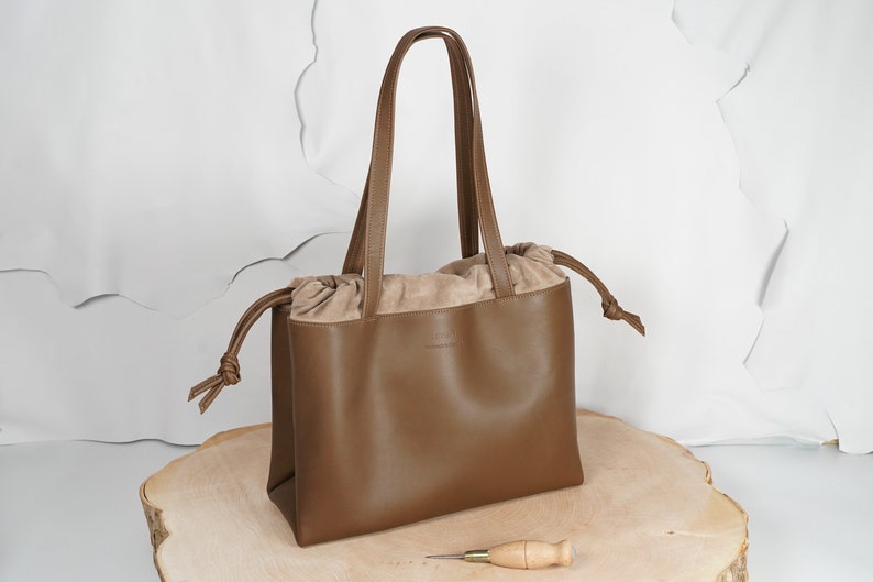 Large handmade leather bag in a pouch shape image 1