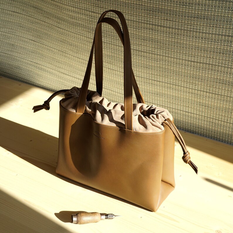 Large handmade leather bag in a pouch shape image 9