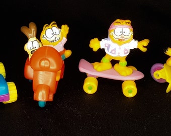 Vintage 1980's Set of 4 Garfield McDonald's Happy Meal Toys (Jeep, skateboard, scooter, moped)