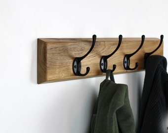 Wall coat rack with black gooseneck hooks