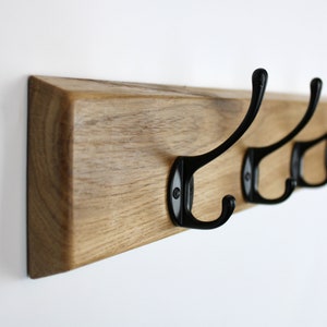 Wall coat rack with black gooseneck hooks image 5