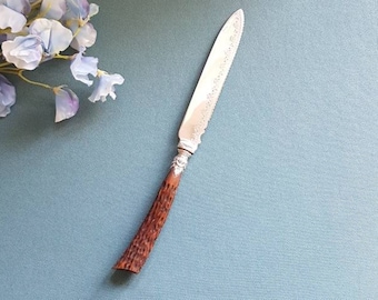 Vintage cake knife- Silver plated serrated blade - Decorative ferrule and blade- Wood effect handle-Early20thC knife- 25cms long