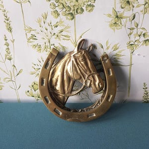 Heurtoir de porte en bronze en forme de la tête d'un cheval - Catawiki Heurtoir de porte en bronze en forme de la tête d'un cheval - Catawiki