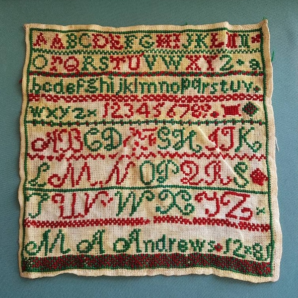 Vintage child's sampler- Handmade alphabet sampler made in red and green stitching -34 cms x 35 cms