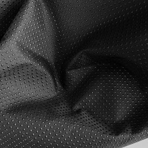 May include: Close-up of a black fabric with a textured surface. The fabric has a pattern of small, evenly spaced dots, creating a tactile and visually interesting design. The material appears to be slightly wrinkled.