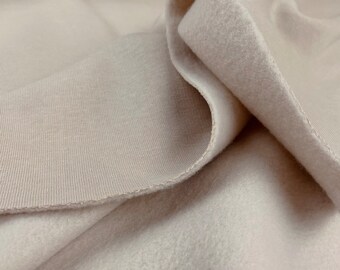 Tissu sweat-shirt jogging avec envers gratté façon polaire | Teneur élevée en coton | Couleur beige | Vendu au demi-mètre