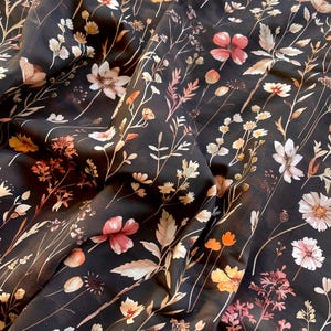 Tejido de punto jersey / Flores otoñales sobre marrón oscuro / Tejido de punto de algodón suave y elástico / Se vende por medio metro