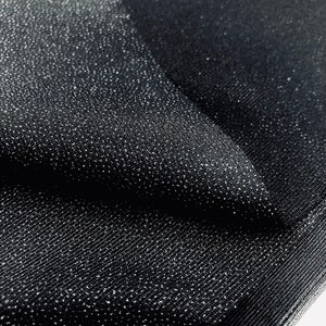 Elastic fusible interfacing - 90cm x 1meter - sold in pieces - black or white